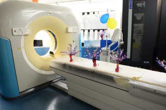 CT scanner in a hospital imaging room