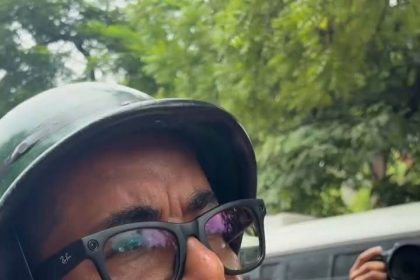 person wearing smart glasses walking in a city