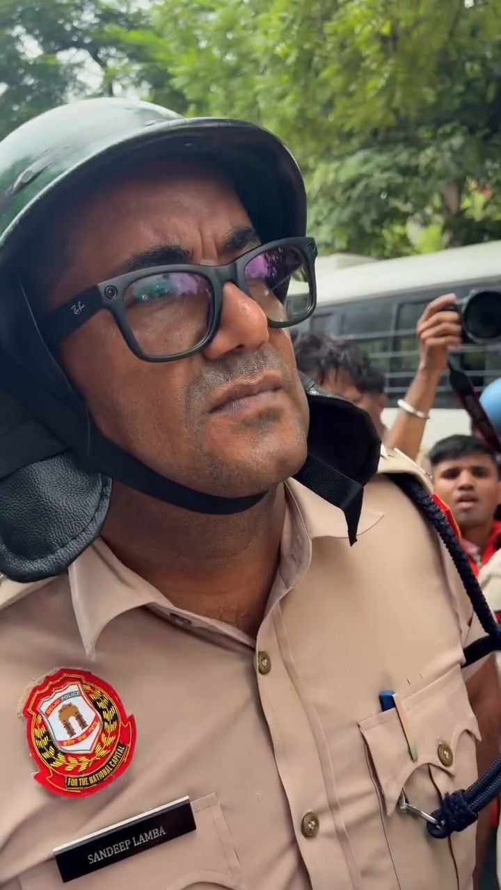 person wearing smart glasses walking in a city