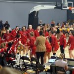 Women's basketball players introduced before a game