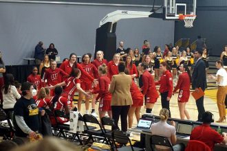 Women's basketball players introduced before a game