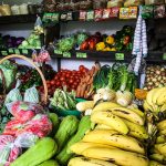 Colourful fresh vegetables arranged at a market stall